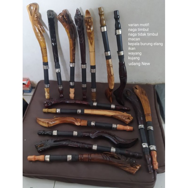 gagang joran pancing pahul kayu ukir motif macan,wayang,naga timbul,naga,ikan,kepala burung,kujang,u