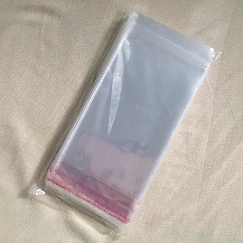 PLASTIK OPP 6 x 10 (100 LEMBAR) 30 MIC SEAL
