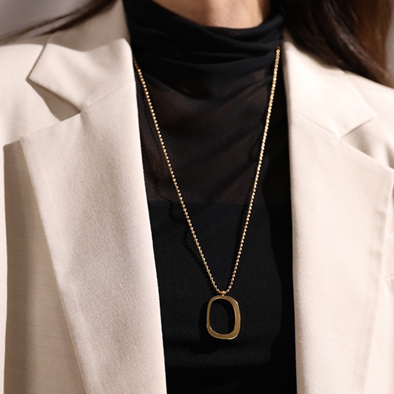 Kalung biji ketumbar liontin abstrak titanium anti karat korea fashion