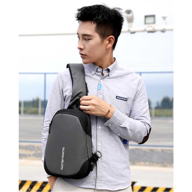 Nunnuburn Tas Selempang Sling Bag Oxford dengan USB Charger Port - 817