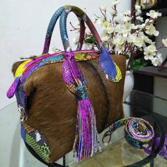 Tas kulit ular asli model natali bulu