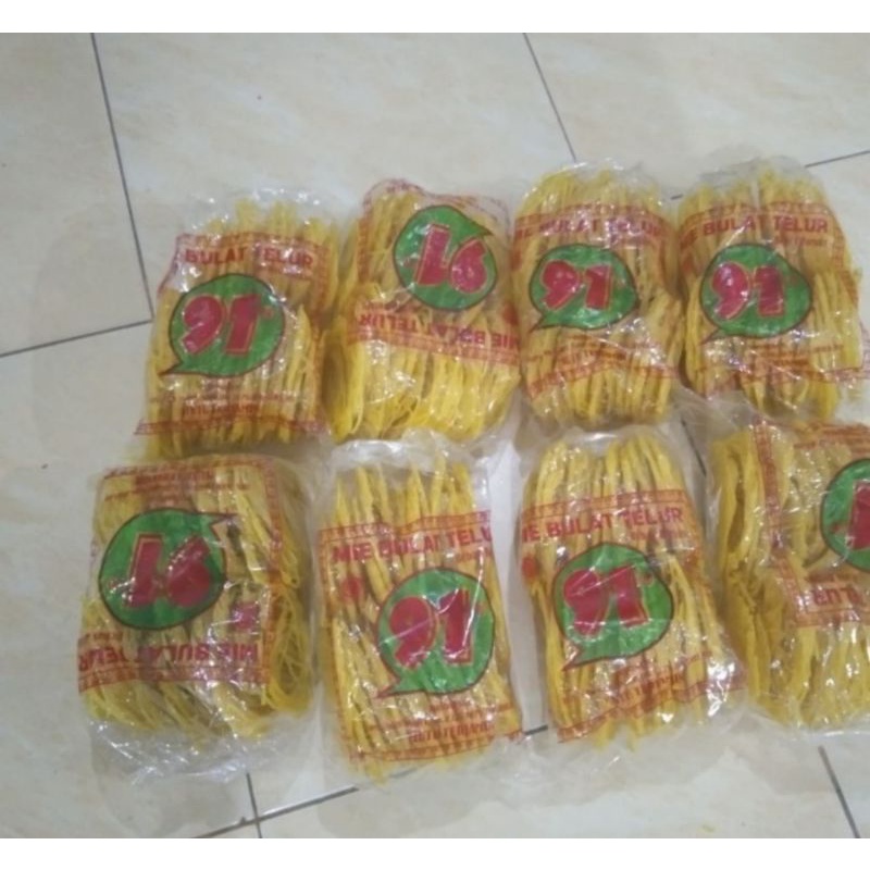 

KRUPUK MIE BULAT TELUR CAP 91 UK.450 GR / KERUPUK OLEH OLEH KHAS MEDAN / MIE LINGKAR KOA