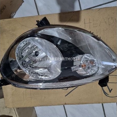 Headlamp / lampu depan kiri nissan march ori