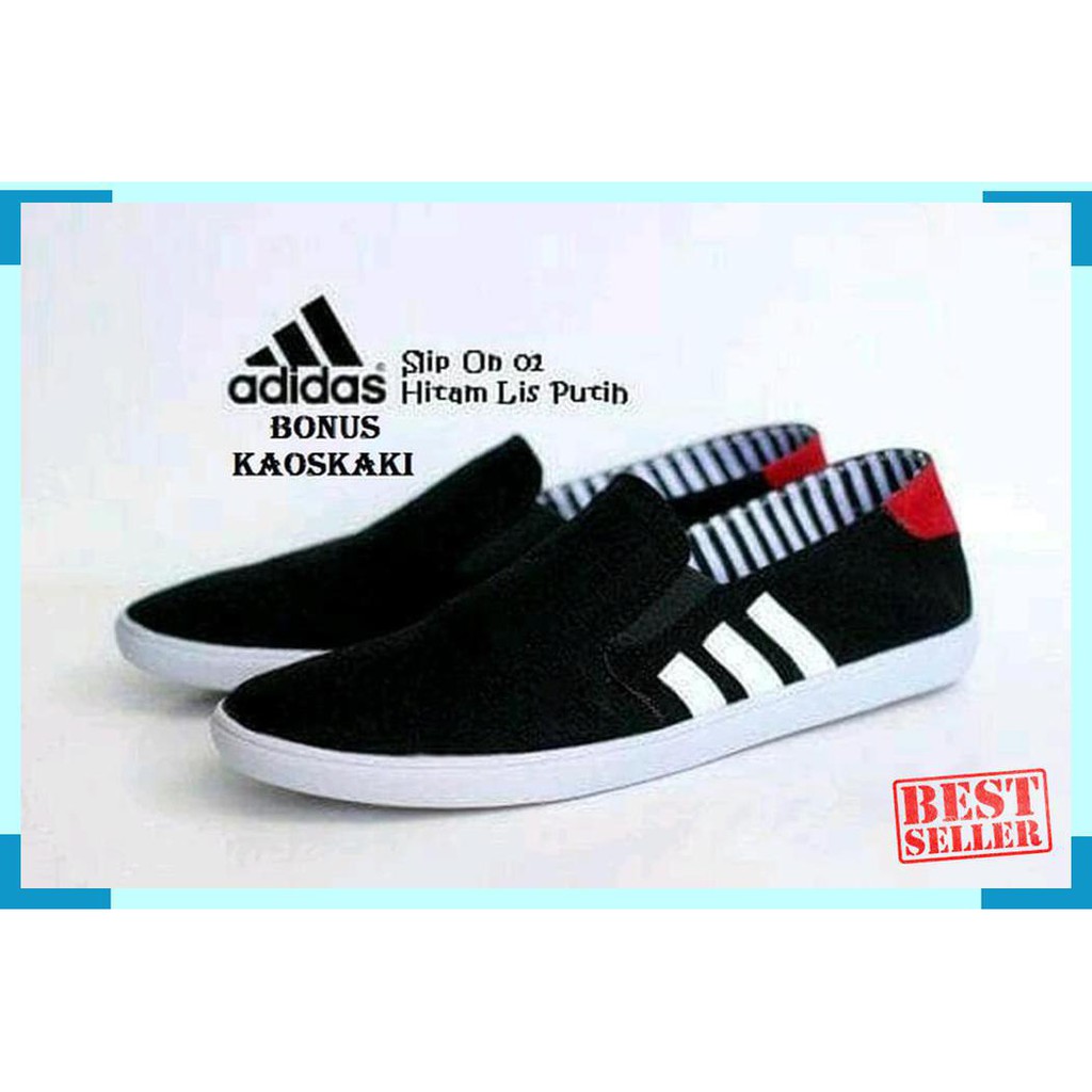 SEPATU PRIA ADIDAS CASUAL SLIP ON KANVAS SLIGHT HITAM PUTIH