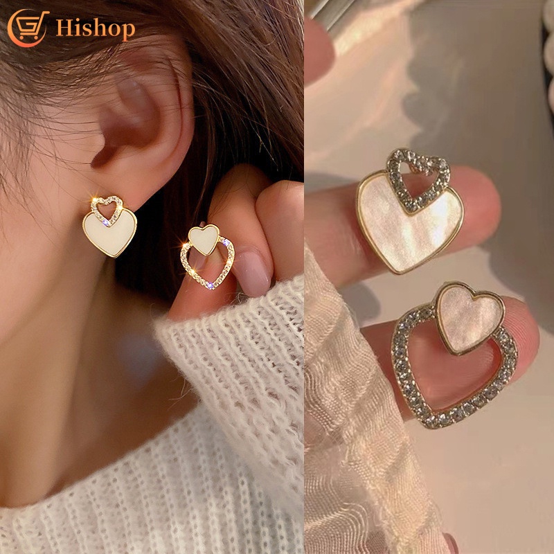 Anting Stud Desain Hati Hollow Aksen Kristal Gaya Elegan Untuk Wanita