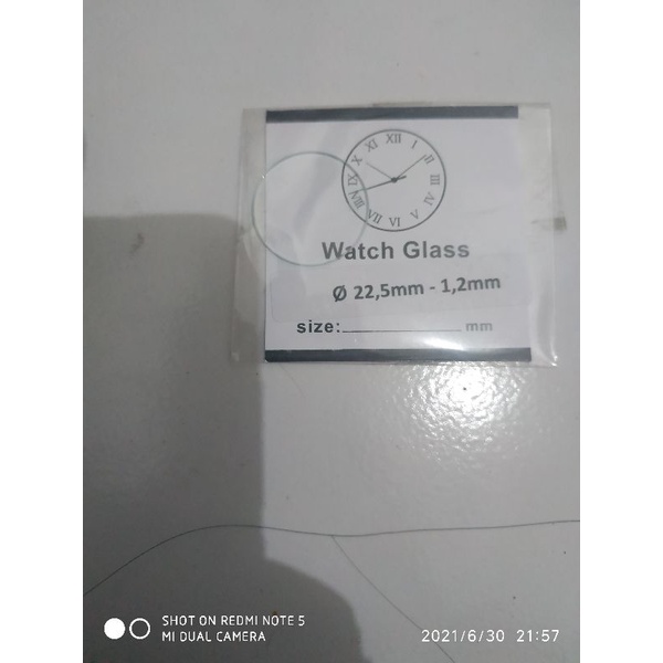 kaca jam tangan bundar bulat
