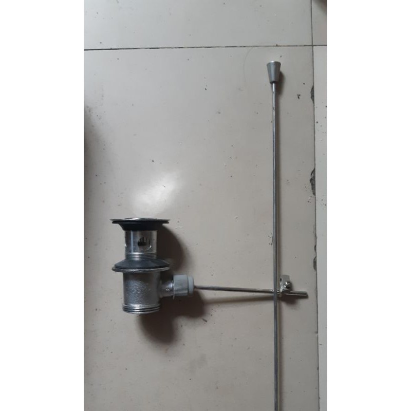 Sifon wastafel otomatis toto