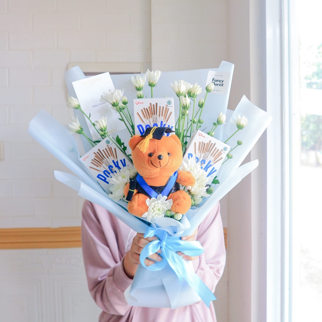 

Snack buket kode 5 - pocky with teddy graduation doll