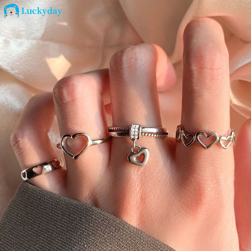 YEEZII 4pcs / Set Cincin Silver Desain Hati Hollow Untuk Wanita