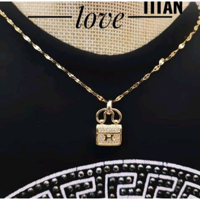 kalung titanium / titanium liontin