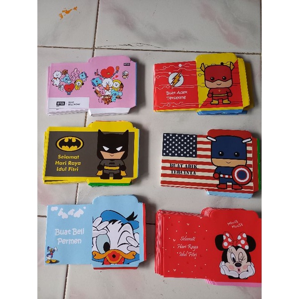 

amplop lebaran lembaran sedang 100 lembar motif kartun