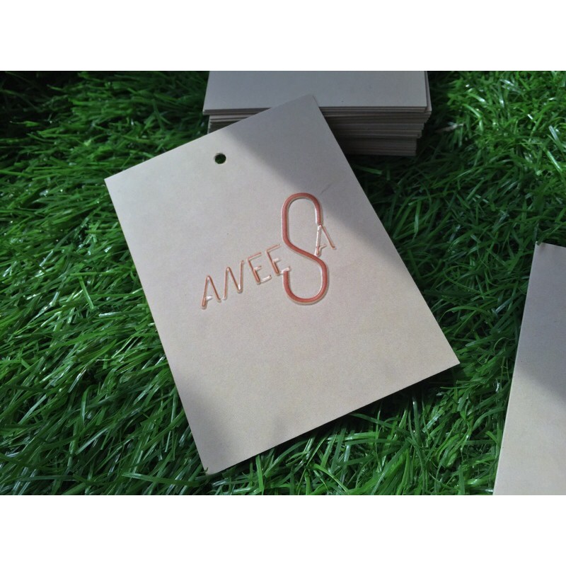 

Hangtag Premium Exclusive Logo emboss 2 sisi paper 350 G doff