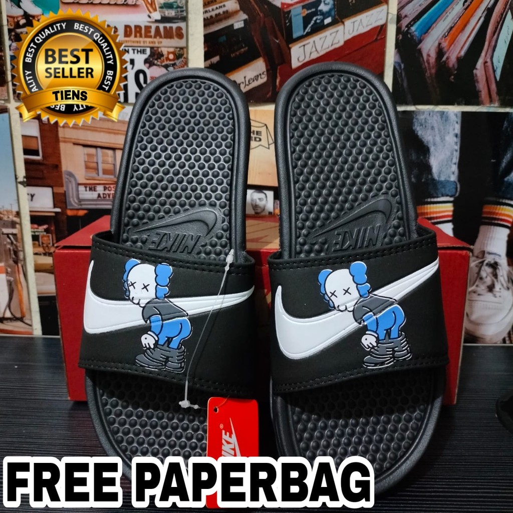SANDAL PREMIUM NIKEEE X KAWS SENDAL SLIDE HITAM ROBOT TERMURAH PRIA WANITA SENDAL SLOP MURAH SELOP F