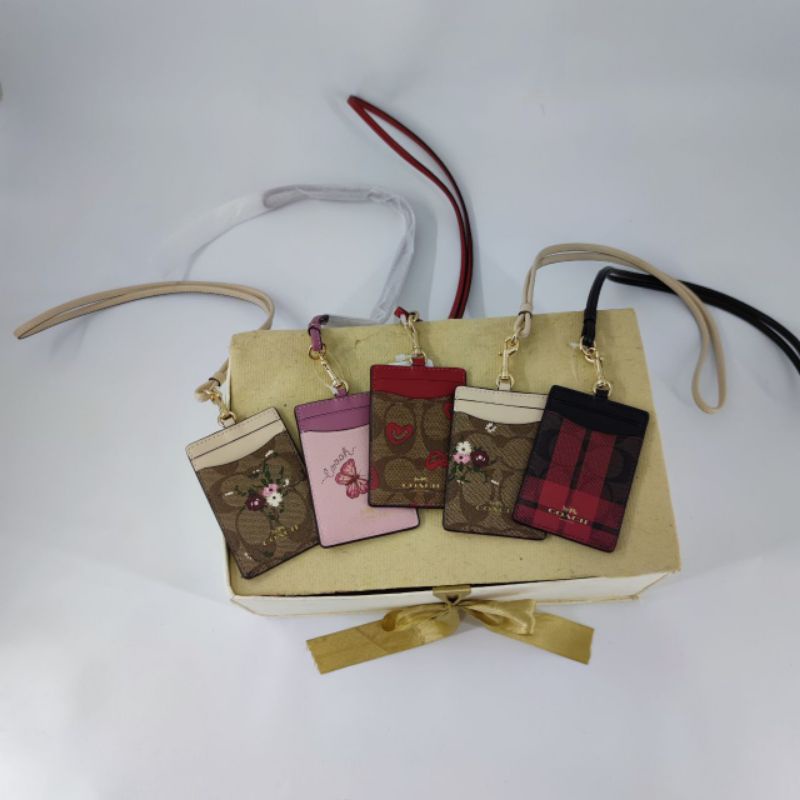 

Lanyard ID Card Coach Wanita Motif Floral Butterfly Authentic