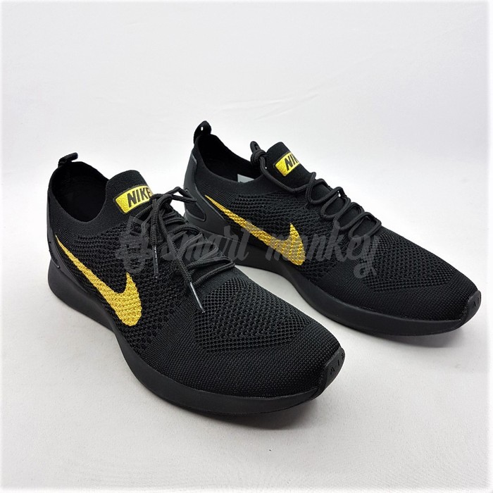 nike flyknit black and gold