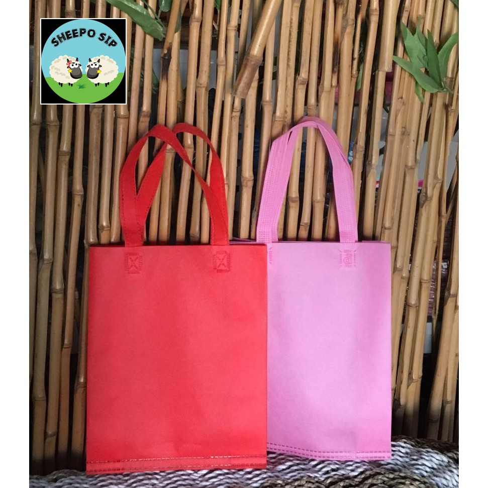 

TAS LIPAT SAMPING SPUNBOND POLOS - GOODIE BAG PACKAGING BAJU KERUDUNG - TAS HAJI POLOS UK 20x25x08