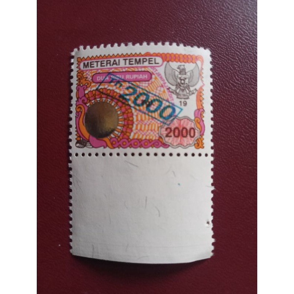 

materai lama 2000 rupiah tahun 2000 original blm terpakai
