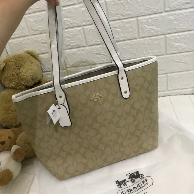 Preloved (NEW) Tas coach tote logo pattern mirror putih krem