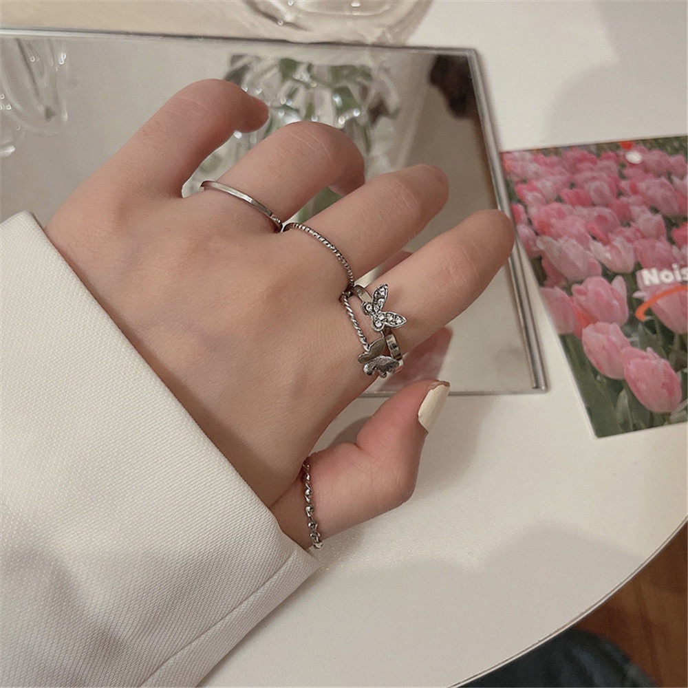 4pcs / Set Cincin Model Terbuka Desain Kupu-Kupu Menari Bergerak Warna Silver Gaya Korea Minimalis Untuk Wanita