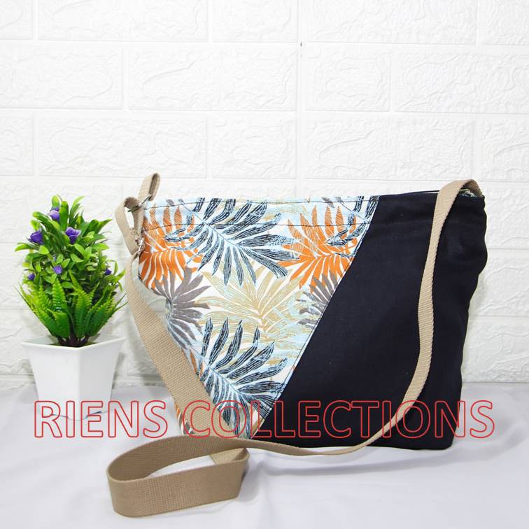 RIENS COLLECTIONS. TAS SELEMPANG SLING BAG KANVAS KOMBINASI FLORAL PALM ORANGE SLC0102