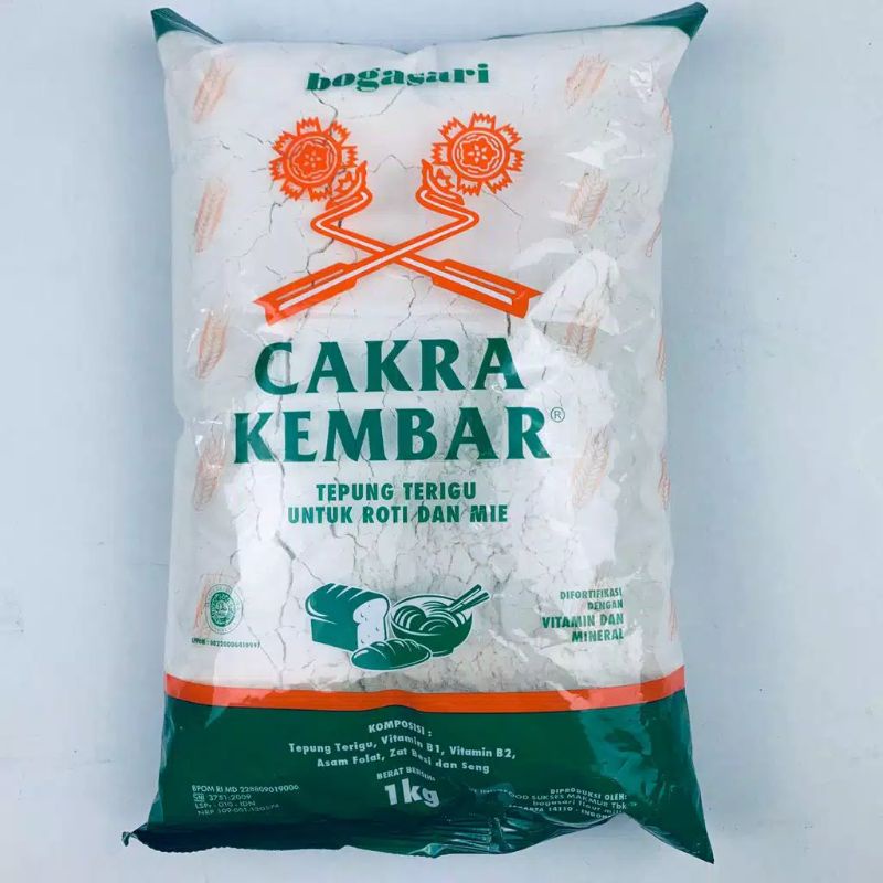 

Tepung Terigu Cakra kembar / Bogasari Cakra kembar 1kg kemasan clear
