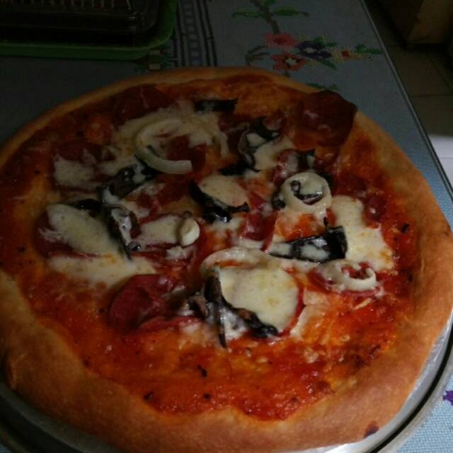 

Pizza Rezqeea