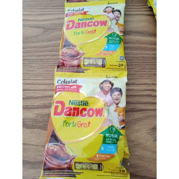 

Susu Dancow forfigro instan Putih(27gr) dan Coklat(39gr).Isi 10 saset