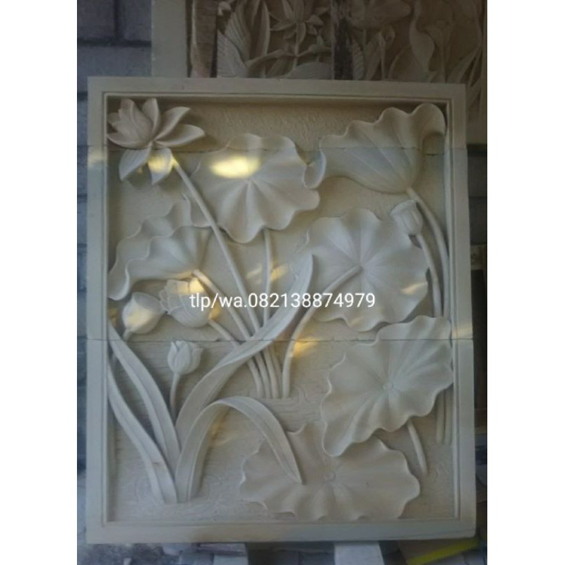 relief batu paras putih