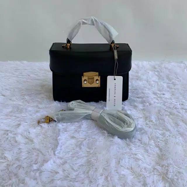 Tas cnk metallic push lock hand bag