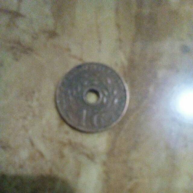 Koin kuno peninggalan belanda tahun 1938 .