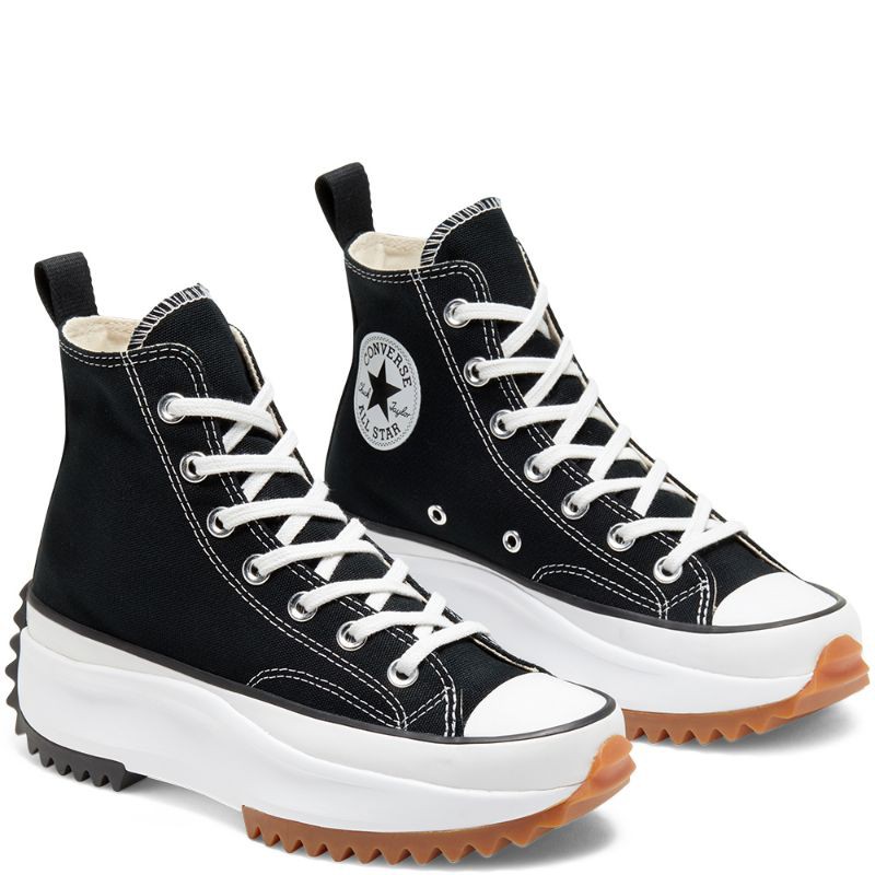 black and white chucks high tops