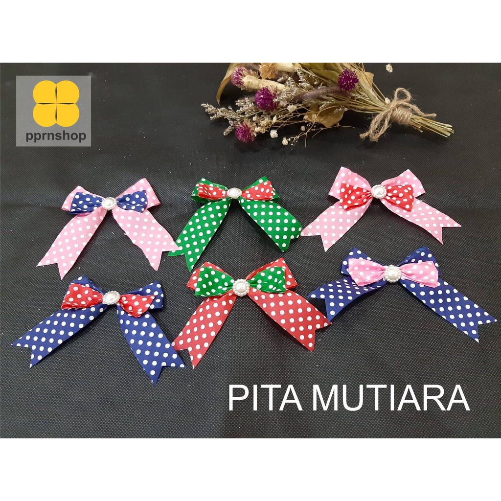 

PITA SOUVENIR MUTIARA TEMPEL/HIASAN SOUVENIR/RIBBON/PITA KADO