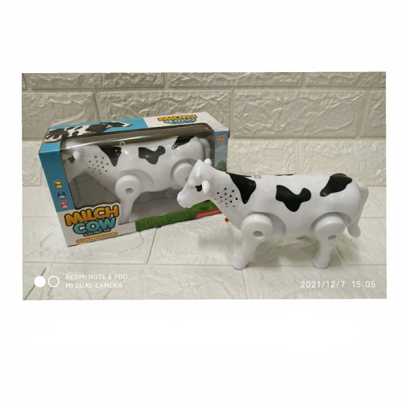 Mainan Sapi kecil bisa jalan batrai