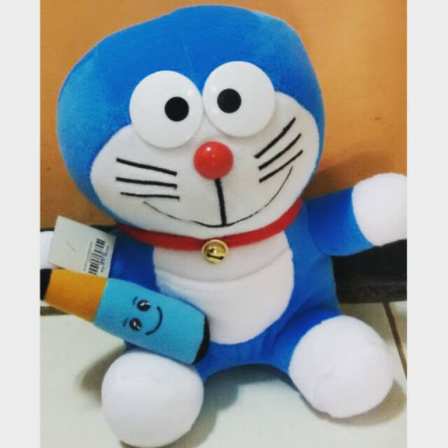 

Doraemon senyum pensil lucu