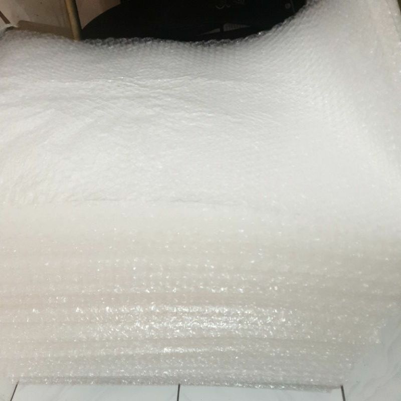 Kertas kado atau bubble wrap - addon