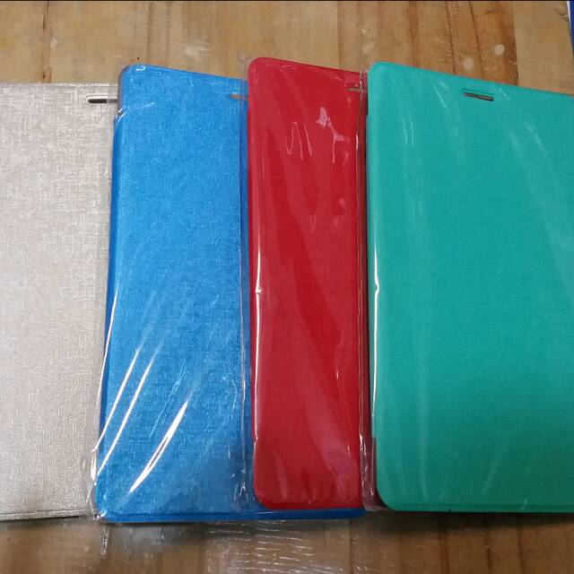 BOOKCOVER ADVAN X7+