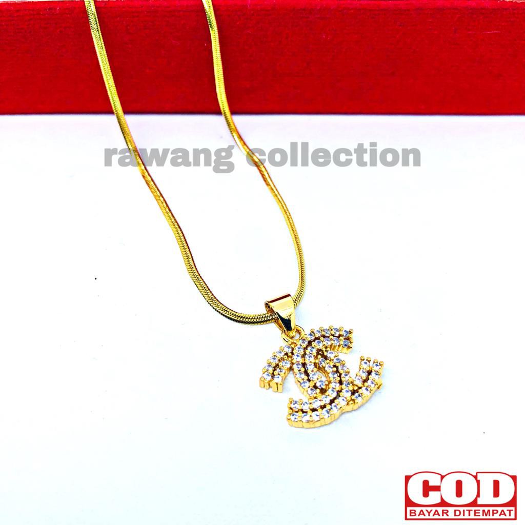 kalung titanium gold plus liontin anti karat selamanya