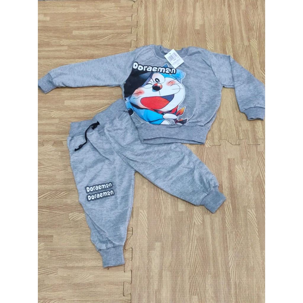 baju stelan KARAKTER anak motip Doraemon U!_!) 1-10thn