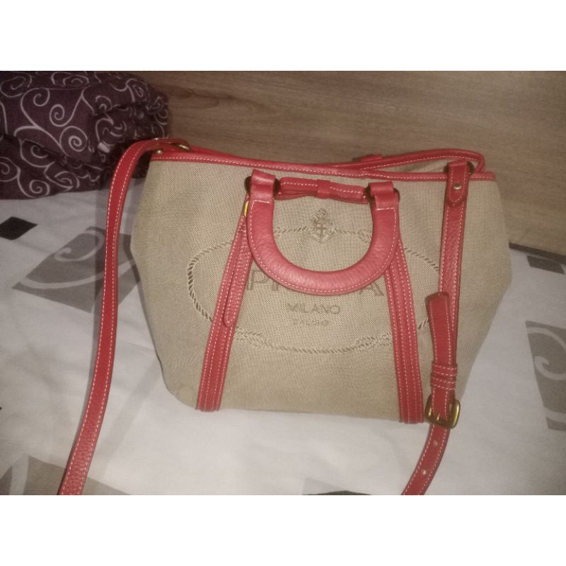 Tas wanita Sling bag PRADA coklat preloved dengan Zipper "Lampo"