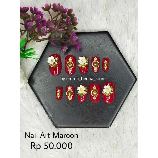 kuku palsu maroon