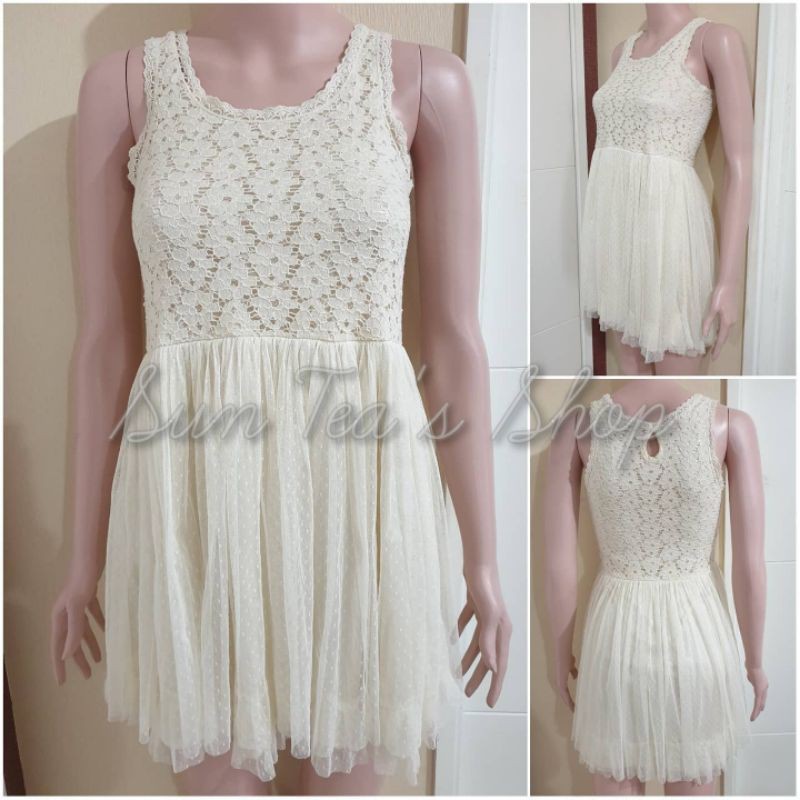 White lace tile babydoll flared dress.