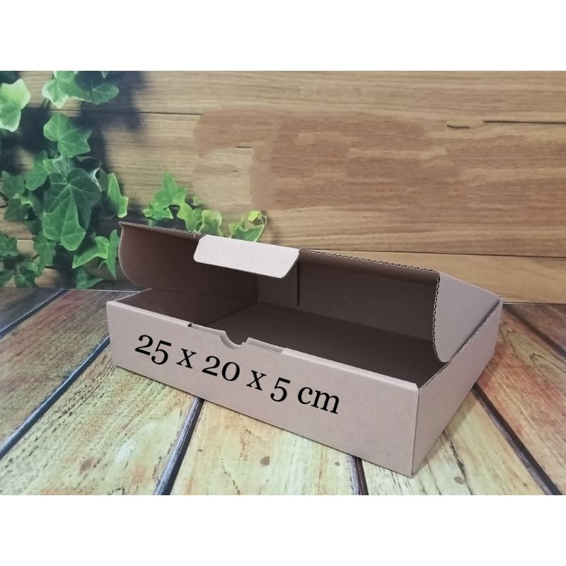 

kardus 25 x 20 x 5cm ..die cut
