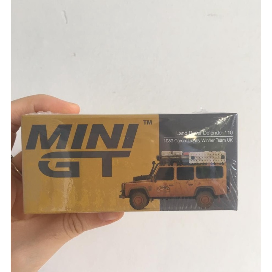 MINI GT 221 LAND ROVER DEFENDER 1101989 CAMEL TROPHY WINNER TEAM UK - MINI GT PREMIUM