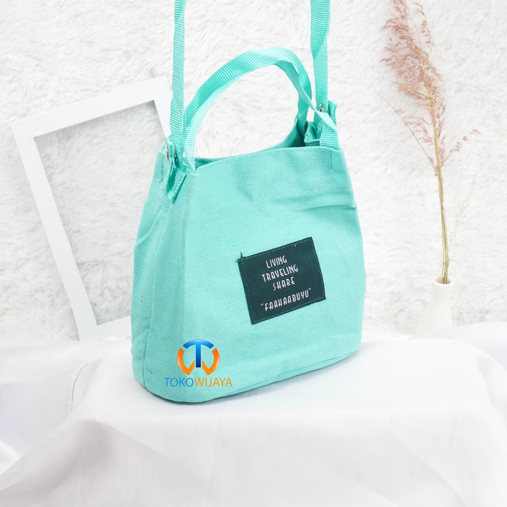 Tas Slempang Living Travel Import | Tote Bag