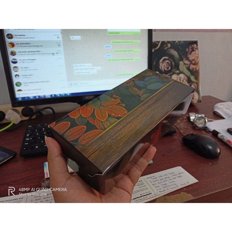 Dus kemasan motif daun