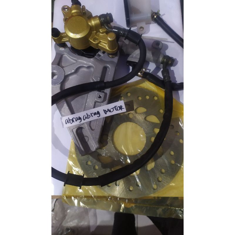 cakram belakang set Supra x125 bukan ori