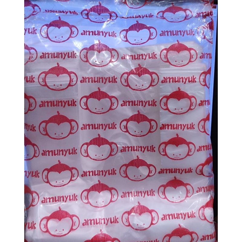 

Kantong cap "Amunyuk" ukuran 15 putih bening isi banyak