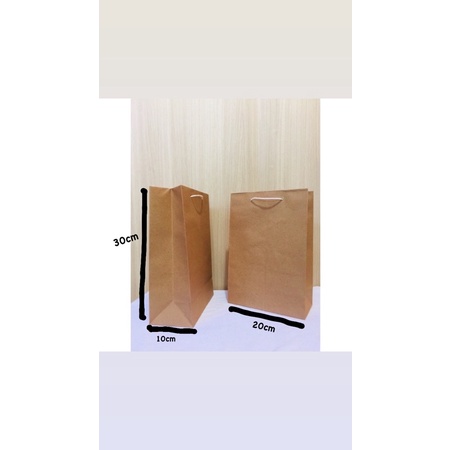 

Paperbag atau tas kertas Polos coklat ukuran 20x30x10