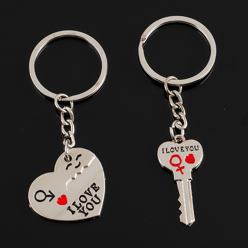 Aksesoris: Set 2Pcs Gantungan Kunci Pasangan Bentuk Hati+Kunci Tulisan 'I Love You' , Warna Silver produk baru mode