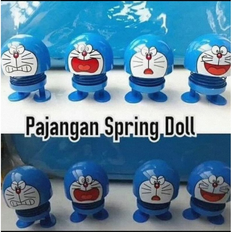 mainan spring doll doraemon